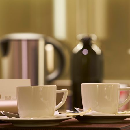 Portobay Flores Buitenkant foto Coffee and tea service